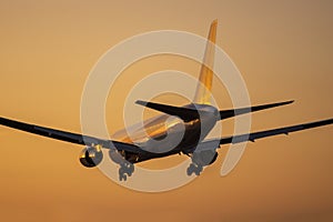 Boeing 767-300 landing at dusk