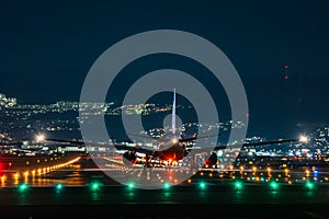 Boeing airplane taking off in the night