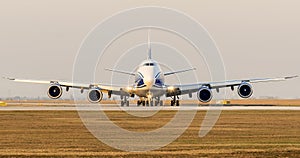 Boeing B747 airplane is taxiing to runway for takeoff