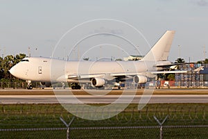Boeing 747 cargo freighter plane taxing at Miami Airport photo