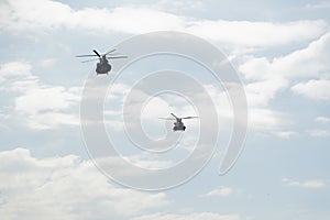 Boeing CH-47 Chinook during an air show. Greek Air Force twin-engine lift helicopters flying on Thessaloniki, Greece during the 28