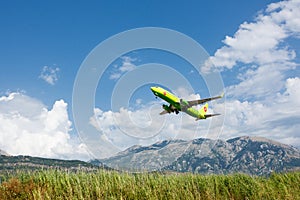 Boeing 737 Next Gen S7 Siberia Airlines taking off at Tivat Airport, Montenegro.