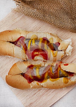 boerie rolls with tomato sauce and mustard