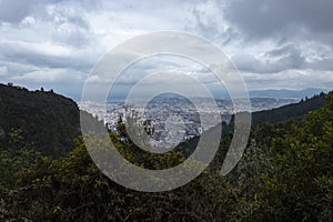 BogotÃÂ¡, Colombia landscape in cloudy blu sky viewed from cerros orientales or eastern hills photo