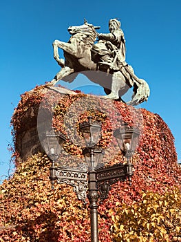 Bohdan Khmelnytsky Statue: Saint Sophia Cathedral in Kyiv, Ukraine in Autumn is Filled with Red Leaves