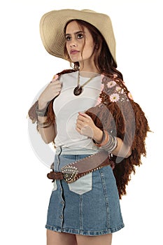 Bohemian festival style attractive model wearing a blank white t-shirt and cowboy hat