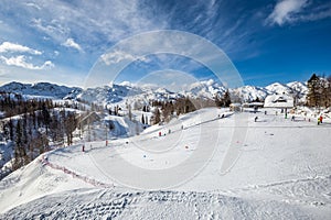 Bohinj, Slovenia - Vogel ski resort in Bohinj in Julian Alps on a sunny winter day with blue sky