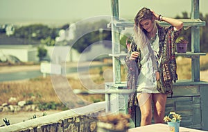 Boho is more than a trend, its a lifestyle. a free spirited young woman enjoying the sunshine outside.