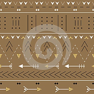 Boho seamless pattern with decorative arrows. Ethnic geometric print with golden glitter texture.