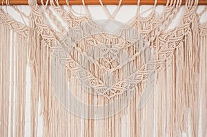Boho style macrame in the living room near the wall
