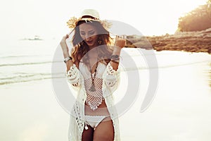 Boho styled model on the beach