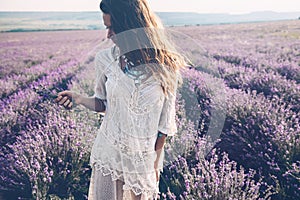 Boho styled model in lavender field