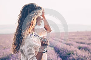 Boho styled model in lavender field