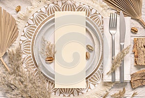 Boho Wedding Table place with Blank card on plate near pampas grass