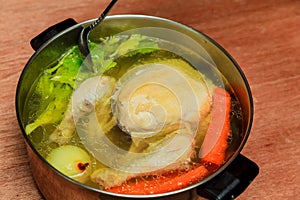 Boil chicken in the pot photo