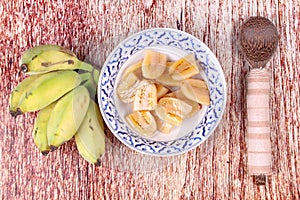 Boiled banana in syrup and wholes of banana.