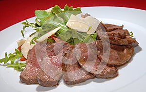 Boiled beef with rukkola