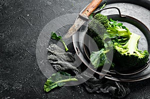 Boiled broccoli on a metal tray. Healthy vegetarian diet food.