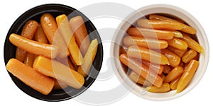 Boiled canned carrots in a bowl isolated on white background.