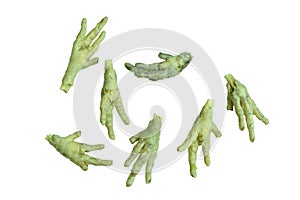 Boiled chicken feet arranging on white background