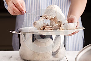 Boiled chicken legs on the plate