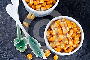 Boiled corn kernels in white cups