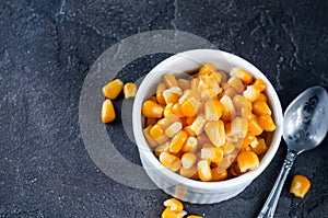 Boiled corn kernels in white cups