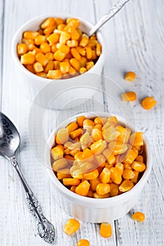 Boiled corn kernels in white cups