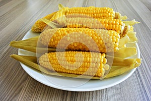 Boiled corns on wood table