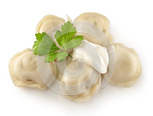 Boiled dumpling with sourcream and parsley