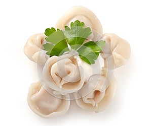 Boiled dumplings with sourcream and parsley