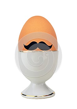 Boiled egg in holder isolated on white