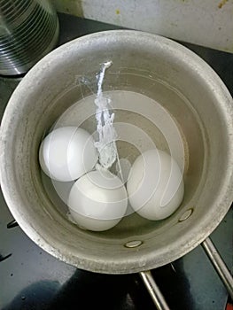 Boiled egg incomplete or partially boiled photo