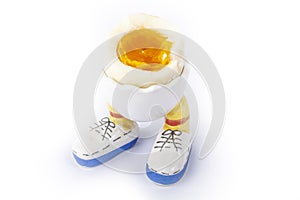 Boiled egg open half with legs isolate