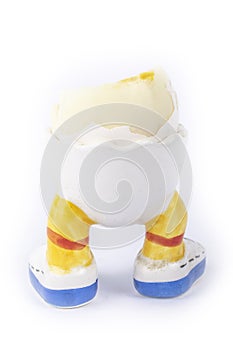 Boiled egg open half with legs isolate