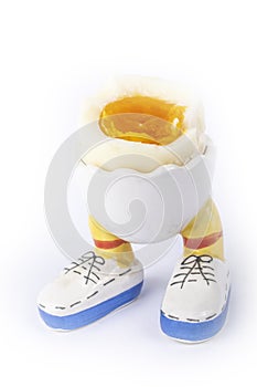 Boiled egg open half with legs isolate