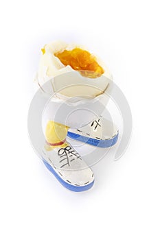 Boiled egg open half with legs isolate