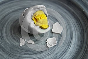 Boiled egg on a plate with with egg yok
