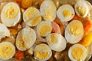 Boiled eggs and chicken in aspic photo