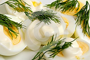 Boiled eggs with mayonnaise and dill.