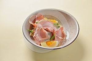 Boiled eggs with smoked ham and vegetables. Healthy vegetarian diet. Veggies salad