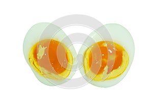 Boiled hen egg half cut with creamy yolk isolated on white background