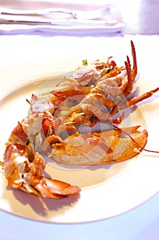 Boiled lobster with cranberry puree