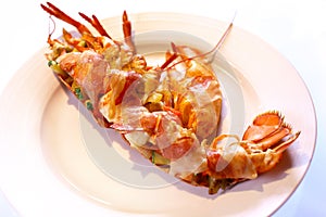 Boiled lobster with cranberry puree