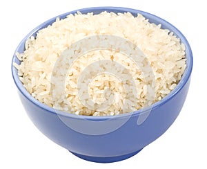 Boiled long grain rice in a lilac bowl close-up is