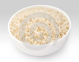 Boiled long grain rice in white bowl close-up