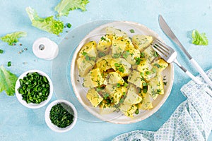 Boiled new potato with butter, dill and green onion