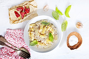 boiled pasta with minced meat and basil