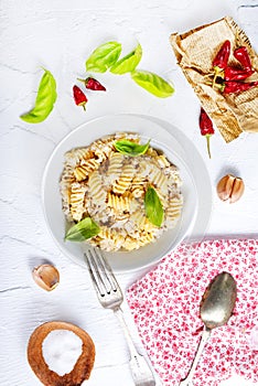 boiled pasta with minced meat and basil