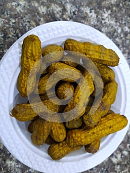 boiled peanuts in a plastic plate
